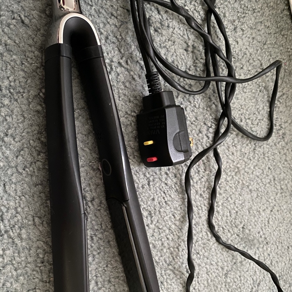 GHD malfunction hair straightener black